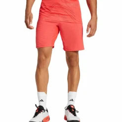adidas Tennis<· Ergo 7IN semi lucid red