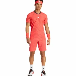 adidas Tennis<· Ergo 7IN semi lucid red