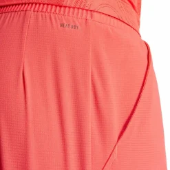 adidas Tennis<· Ergo 7IN semi lucid red