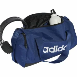 adidas Taschen<· LINEAR DUFFEL XSMALL dark blue-white