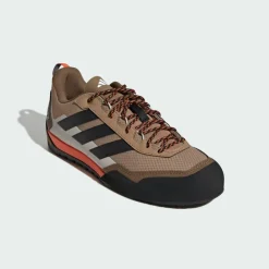 adidas Sneaker<· Terrex Skychaser Solo Zustiegsschuh Cardboard / Carbon / Semi Impact Orange